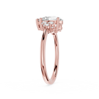 Rose gold ring with a diamond on a white background