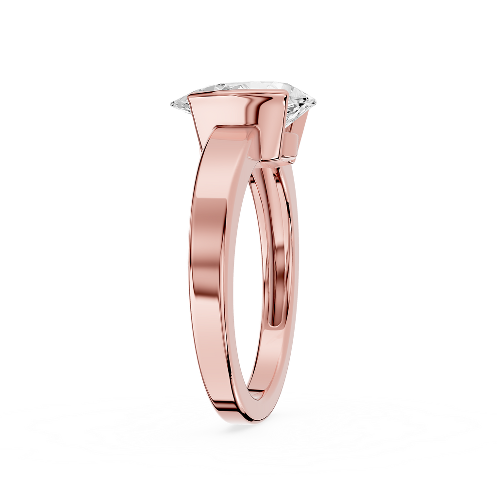 Rose gold ring with a diamond on a white background