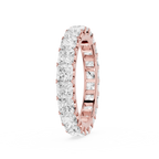 A Rose gold eternity ring paved with square-cut clear diamonds, shown on a clean white background.