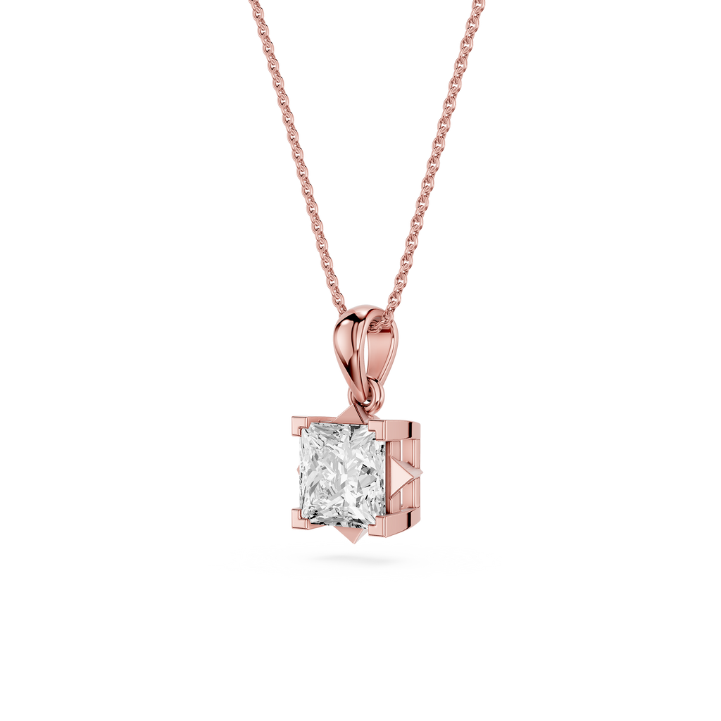 Rose gold pendant with a clear gemstone on a white background