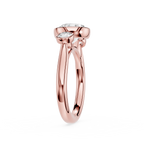 Rose gold ring with a diamond on a white background