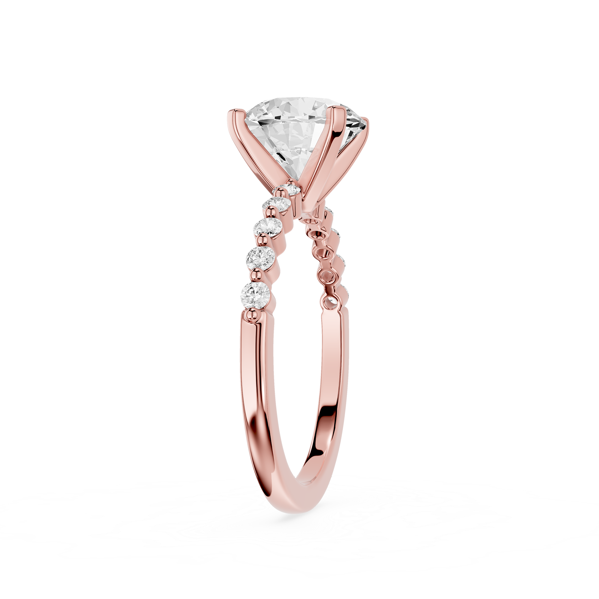 A rose gold engagement ring featuring a large pear-cut diamond center stone and a pavé band with small round diamonds, shown on a clean white background.