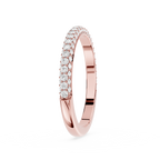 Rose gold ring with diamonds on a white background