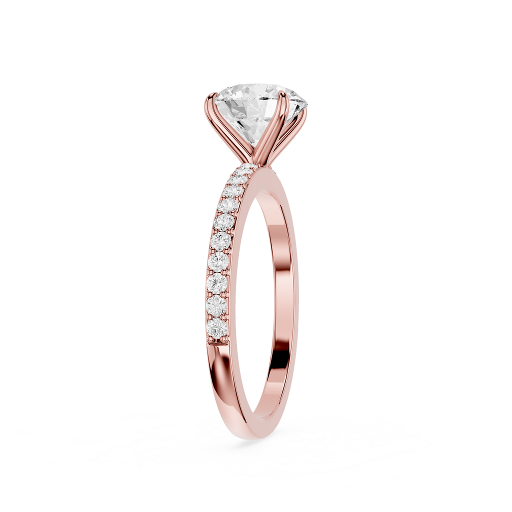 A rose gold diamond ring with a large round-cut center stone and a pavé band of small round diamonds, shown on a clean white background.