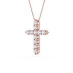 Rose gold cross pendant with diamonds on a white background