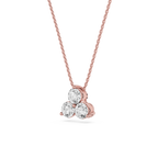 Rose gold necklace with a three-stone diamond pendant on a white background