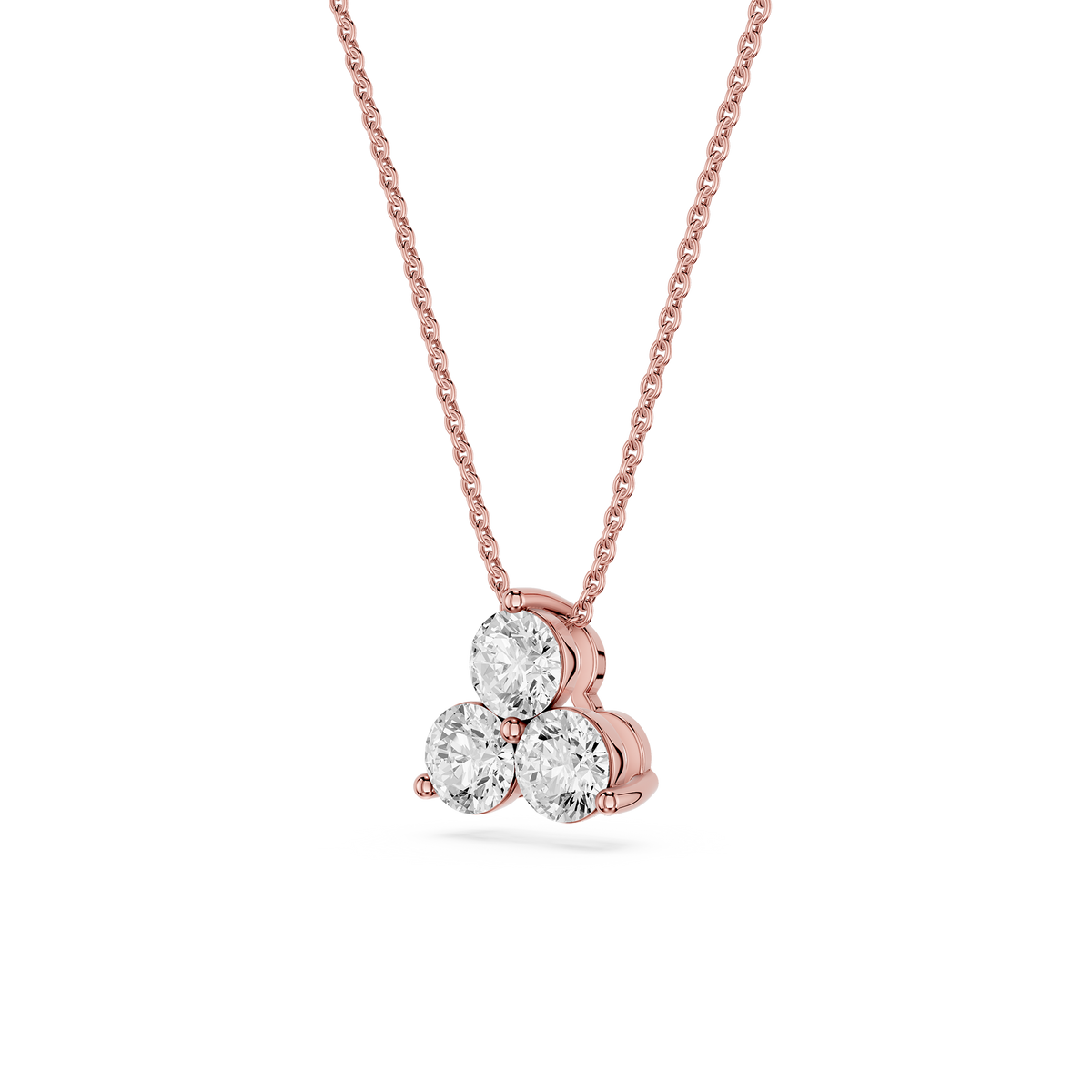 Rose gold necklace with a three-stone diamond pendant on a white background