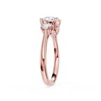 Rose gold ring with a diamond on a white background