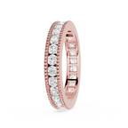 Gold ring with diamond accents on a white background