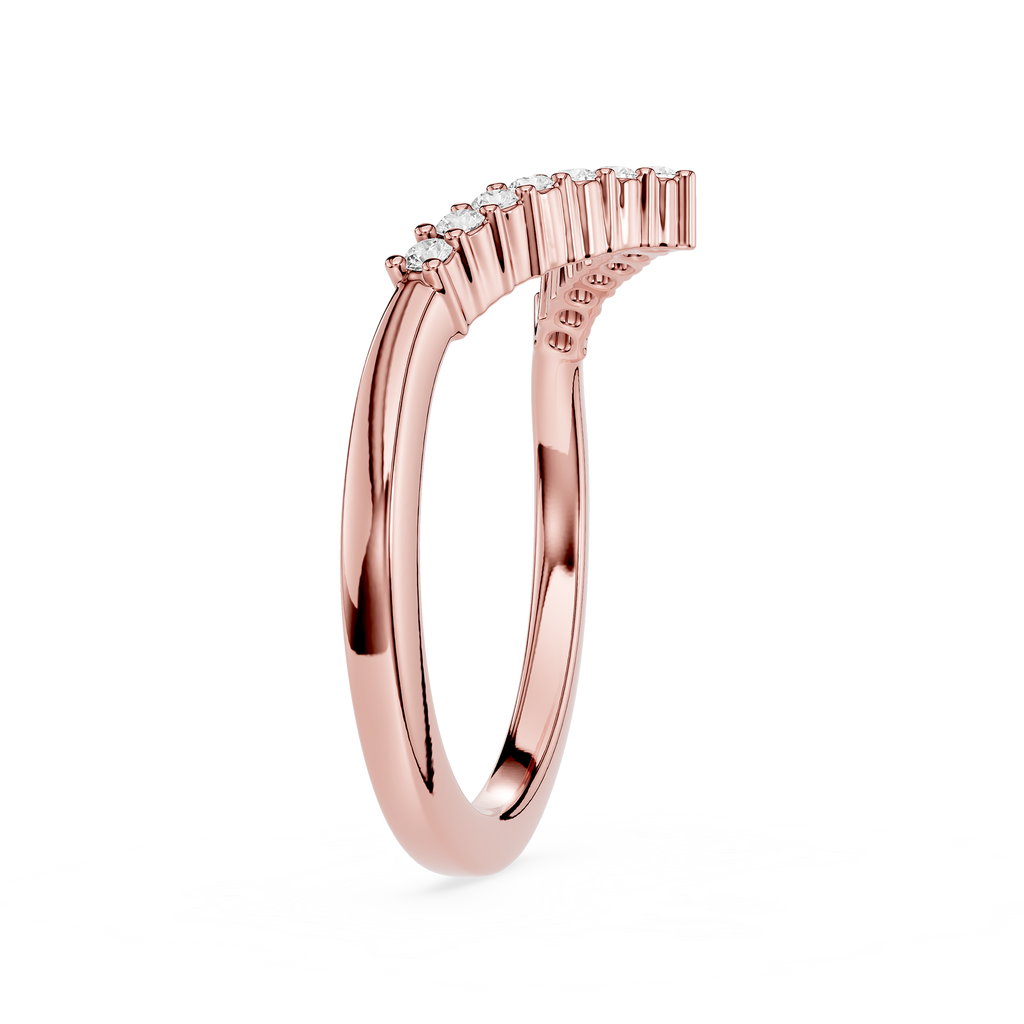 Rose gold ring with small diamonds on a white background