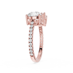 A yellow gold diamond ring with a large round-cut center stone and a pavé band set with small round diamonds, shown on a plain white background.