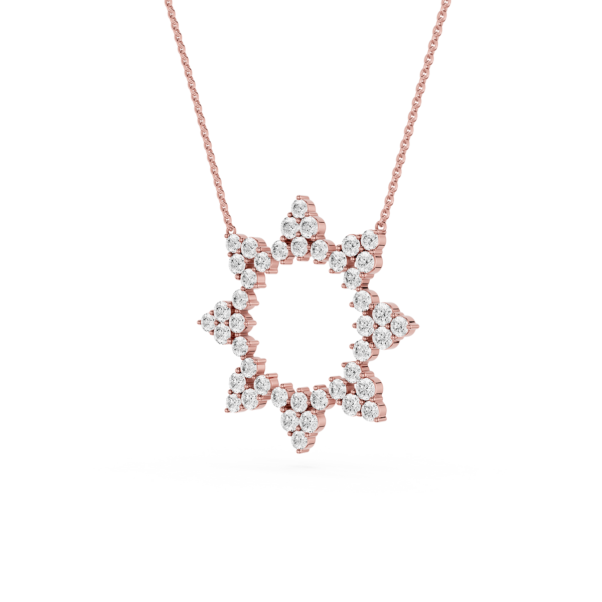 Rose gold necklace with a star-shaped pendant on a white background