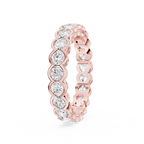 Scalloped diamond eternity ring in rose gold displaying round brilliant stones framed by smooth curved metal edges