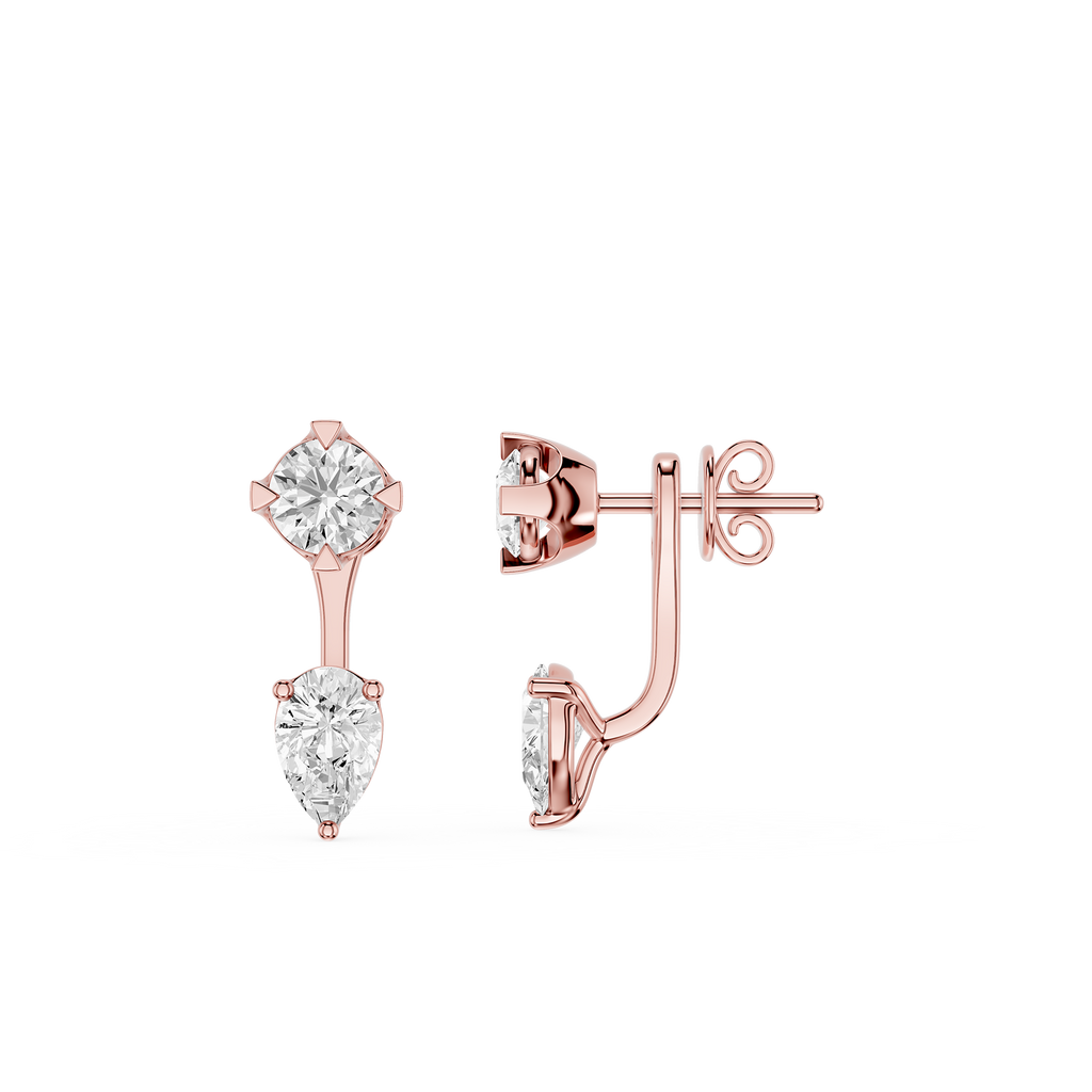 Rose gold earrings with clear gemstones on a white background