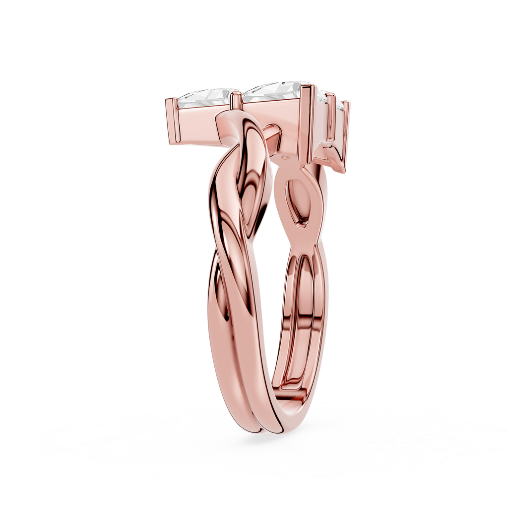 Silver ring with a twisted design on a white background