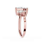 Rose gold ring with a diamond on a white background