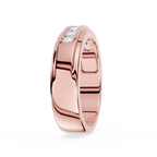 Rose gold ring with a diamond on a white background