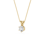 Gold necklace with a diamond pendant on a white background