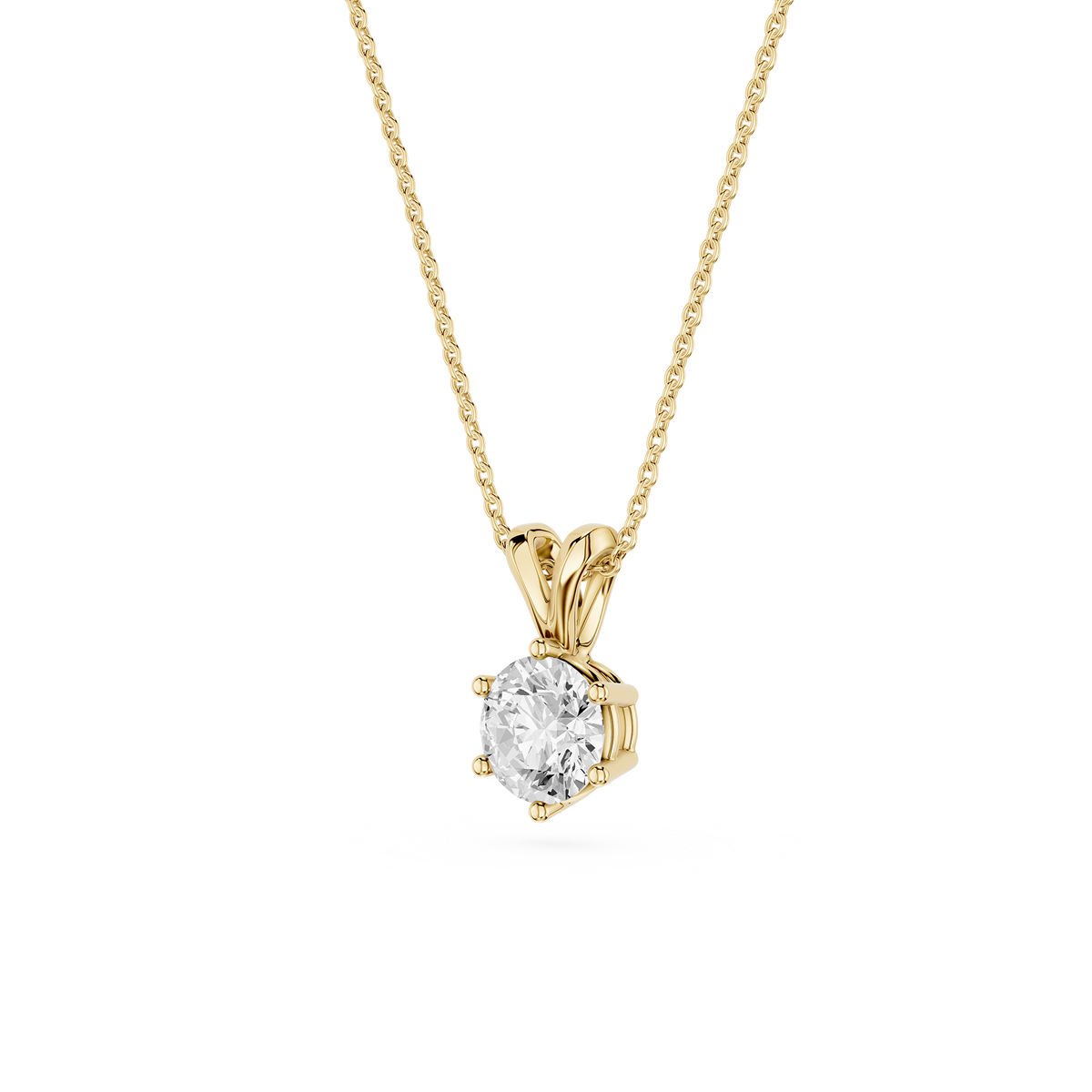 Gold necklace with a diamond pendant on a white background