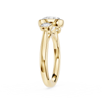 Gold ring with a diamond on a white background