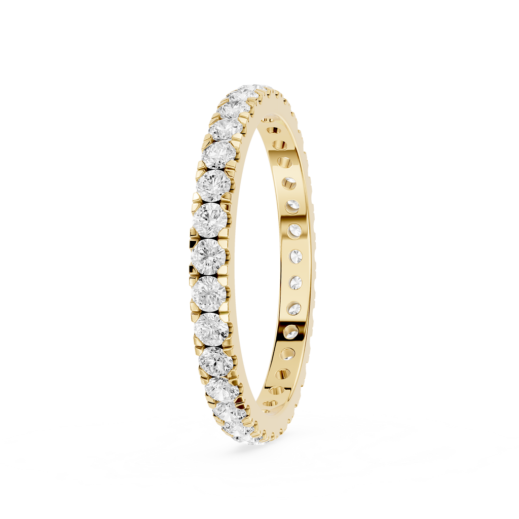 Gold ring with diamonds on a white background