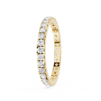 Gold ring with diamonds on a white background
