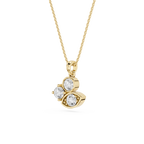 Gold necklace with a three-stone pendant on a white background