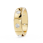 Gold ring with embedded diamonds on a white background