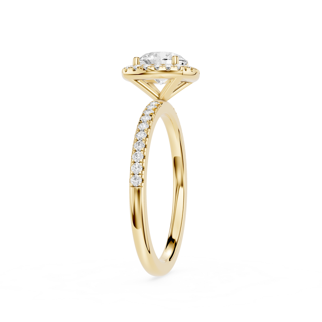 Gold ring with a diamond on a white background