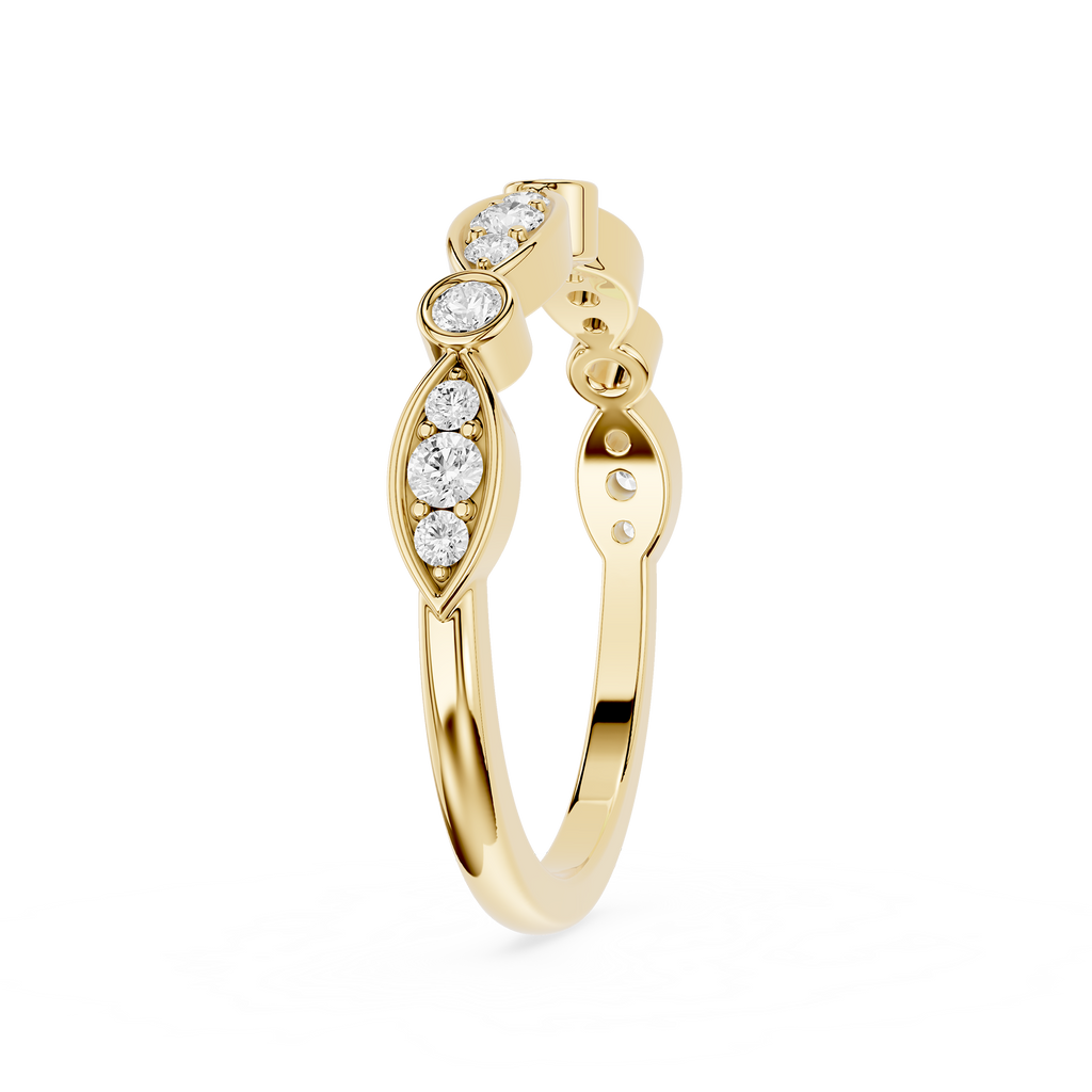 Gold ring with diamond accents on a white background