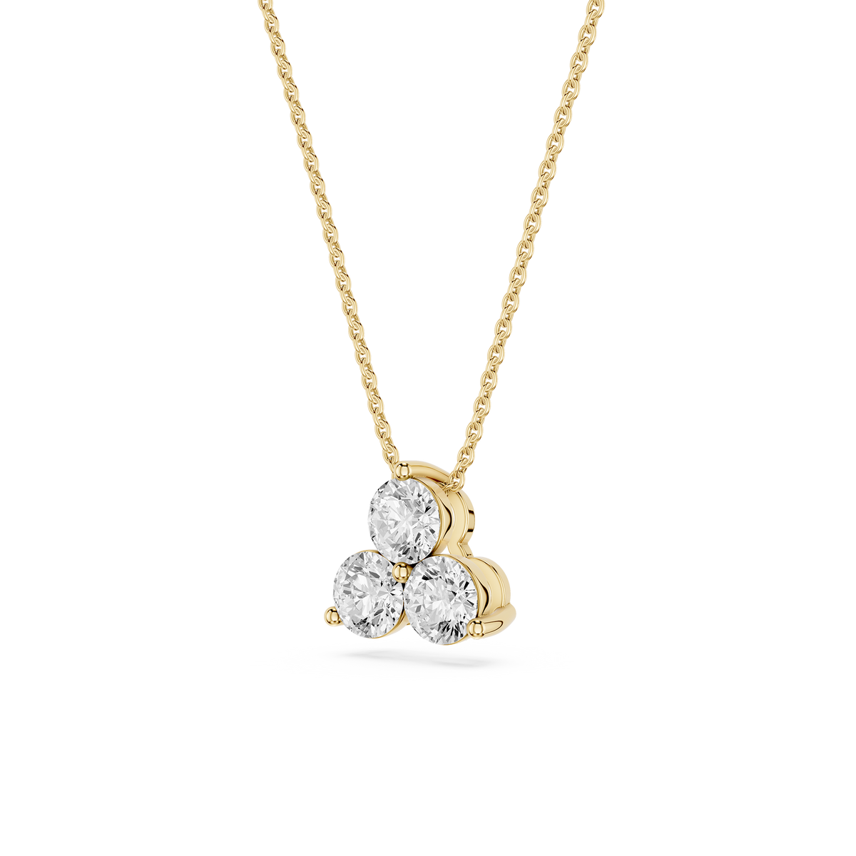 Gold necklace with a heart-shaped diamond pendant on a white background