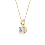 Gold pendant necklace with a clear gemstone on a white background