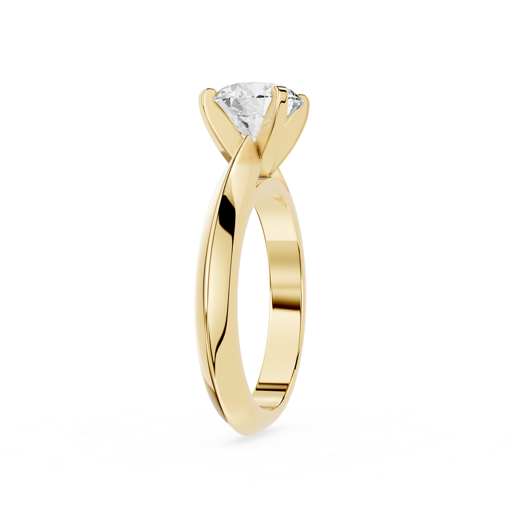 Gold ring with a diamond on a white background