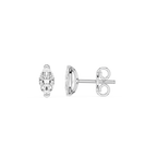 Four metallic brake pads on a white background