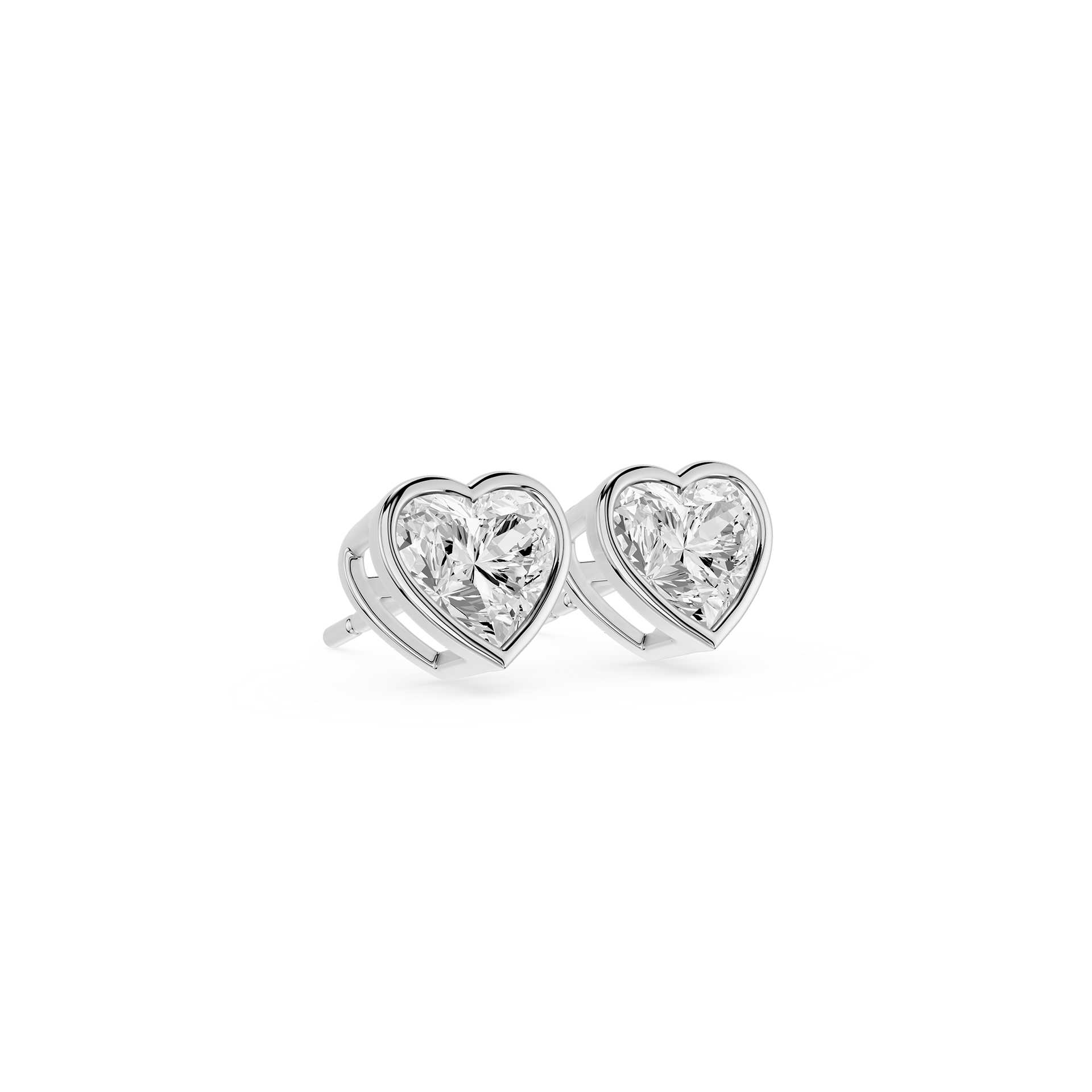 Heart-shaped diamond earrings on a white background