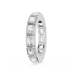 A silver-toned eternity ring featuring a row of rectangular baguette-cut clear gemstones, shown on a clean white background.