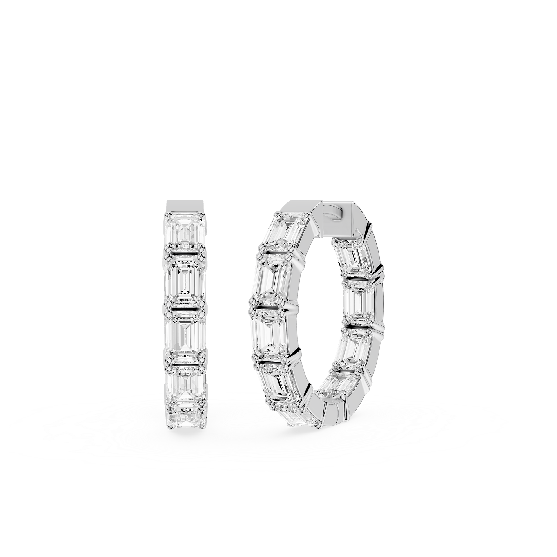 Pair of diamond hoop earrings on a white background