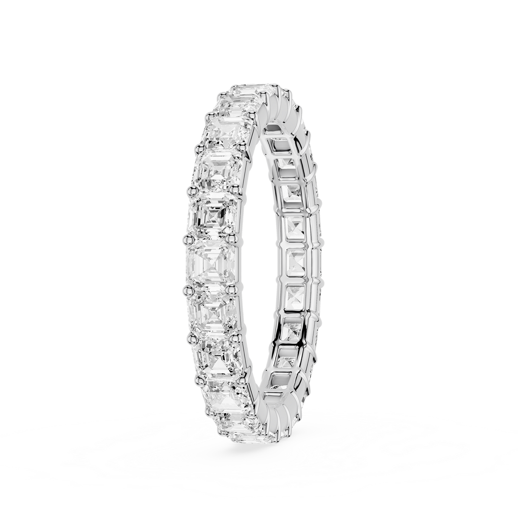 Silver ring with embedded diamonds on a white background