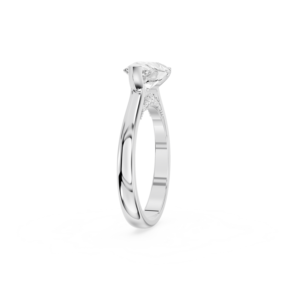 Sideways pear cut lab diamond solitaire ring in white gold with a smooth band and open asymmetric bezel setting