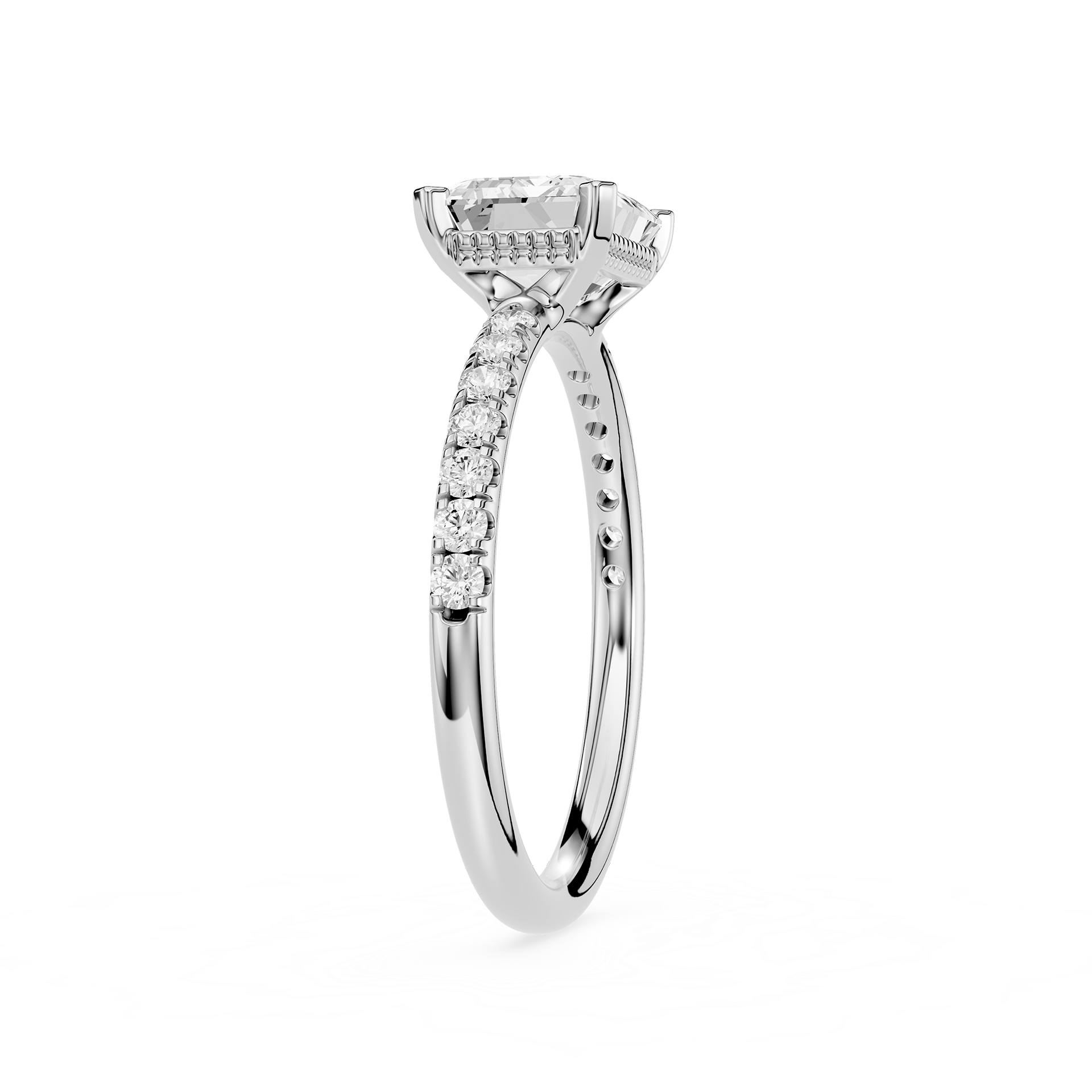 A silver-toned diamond engagement ring with a round center stone and a pavé band, shown on a plain white background.