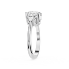Diamond ring with a white gold band on a white background