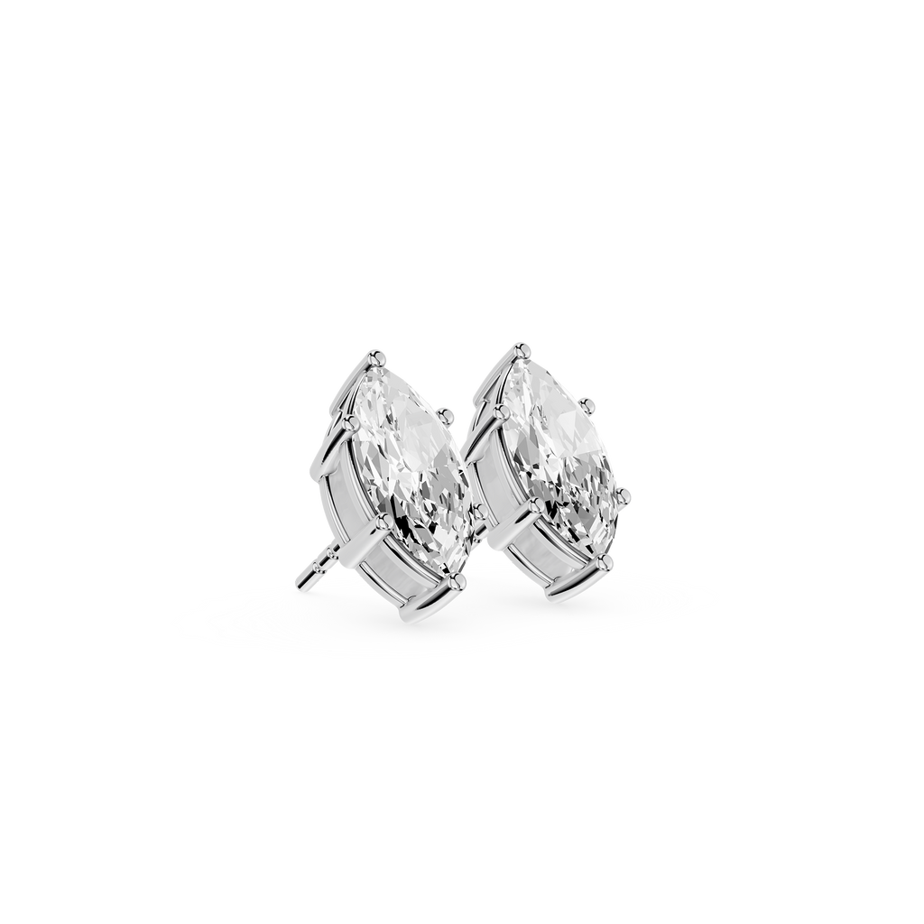 Pair of pear-shaped crystal stud earrings on a white background