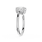 Diamond ring with a rectangular cut gemstone on a white background