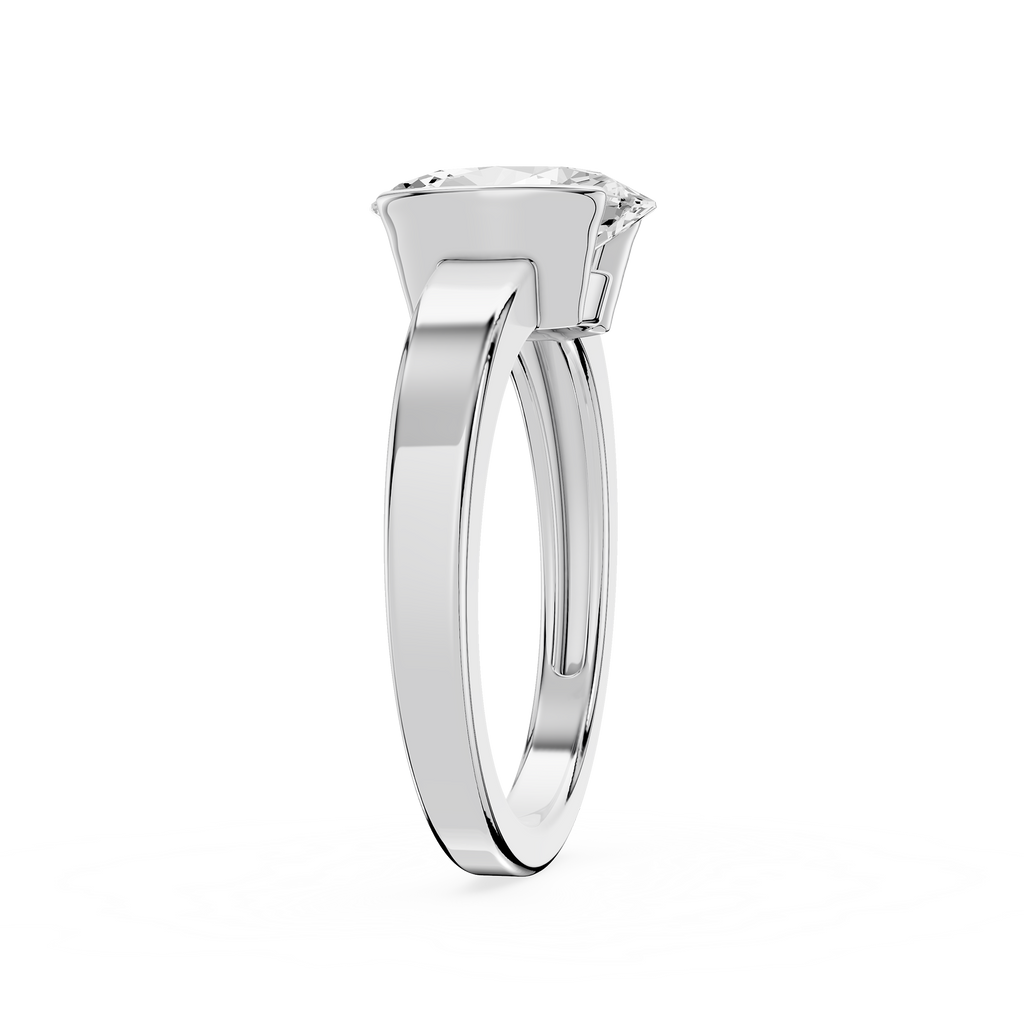 Silver ring with a diamond on a white background