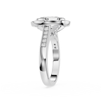 Silver ring with diamond accents on a white background