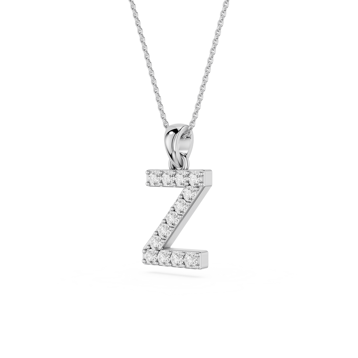 Diamond-studded letter 'Z' pendant on a chain against a white background
