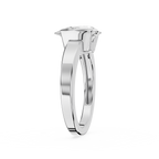 Silver ring with a diamond on a white background