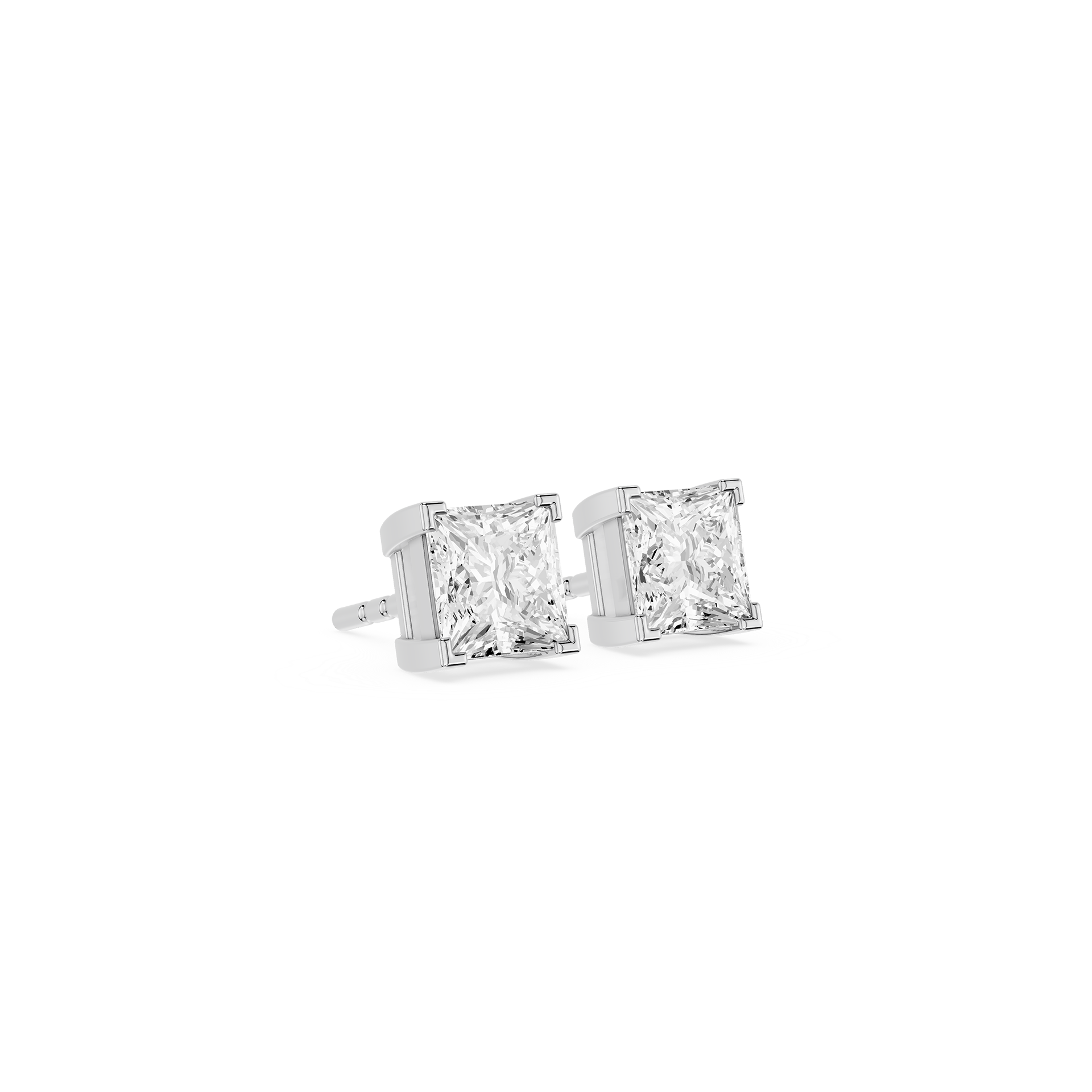 Pair of diamond stud earrings on a white background