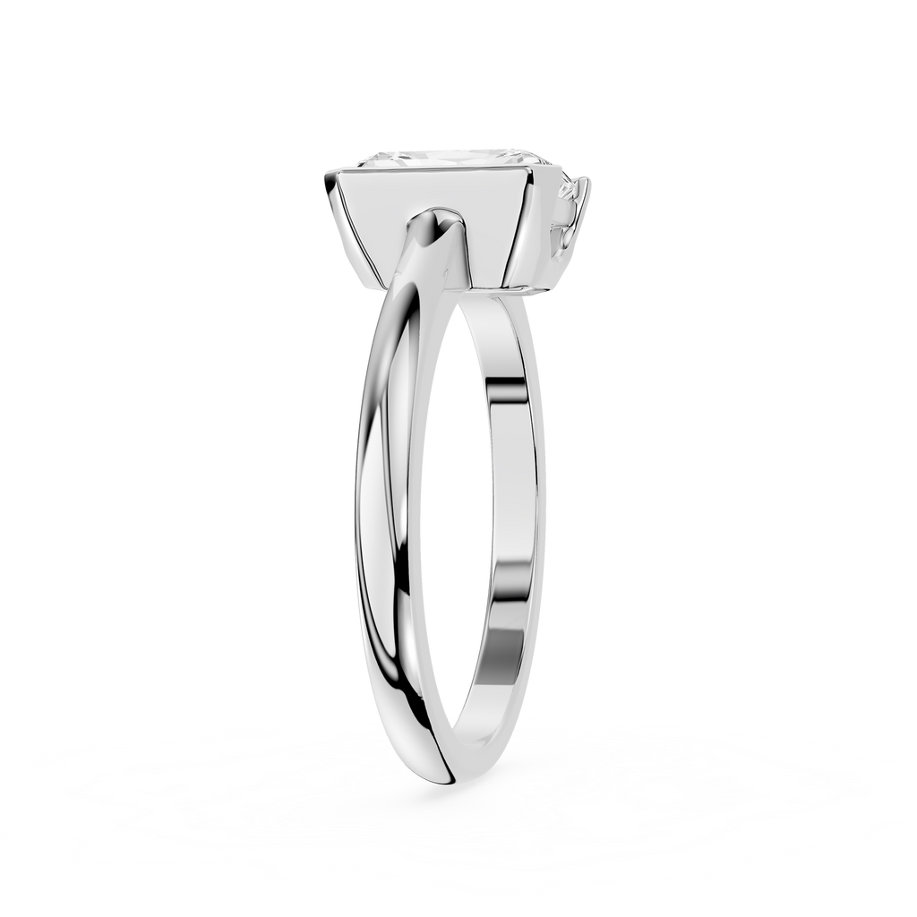 Silver ring with a diamond on a white background