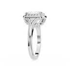 Diamond ring with a white gold band on a white background